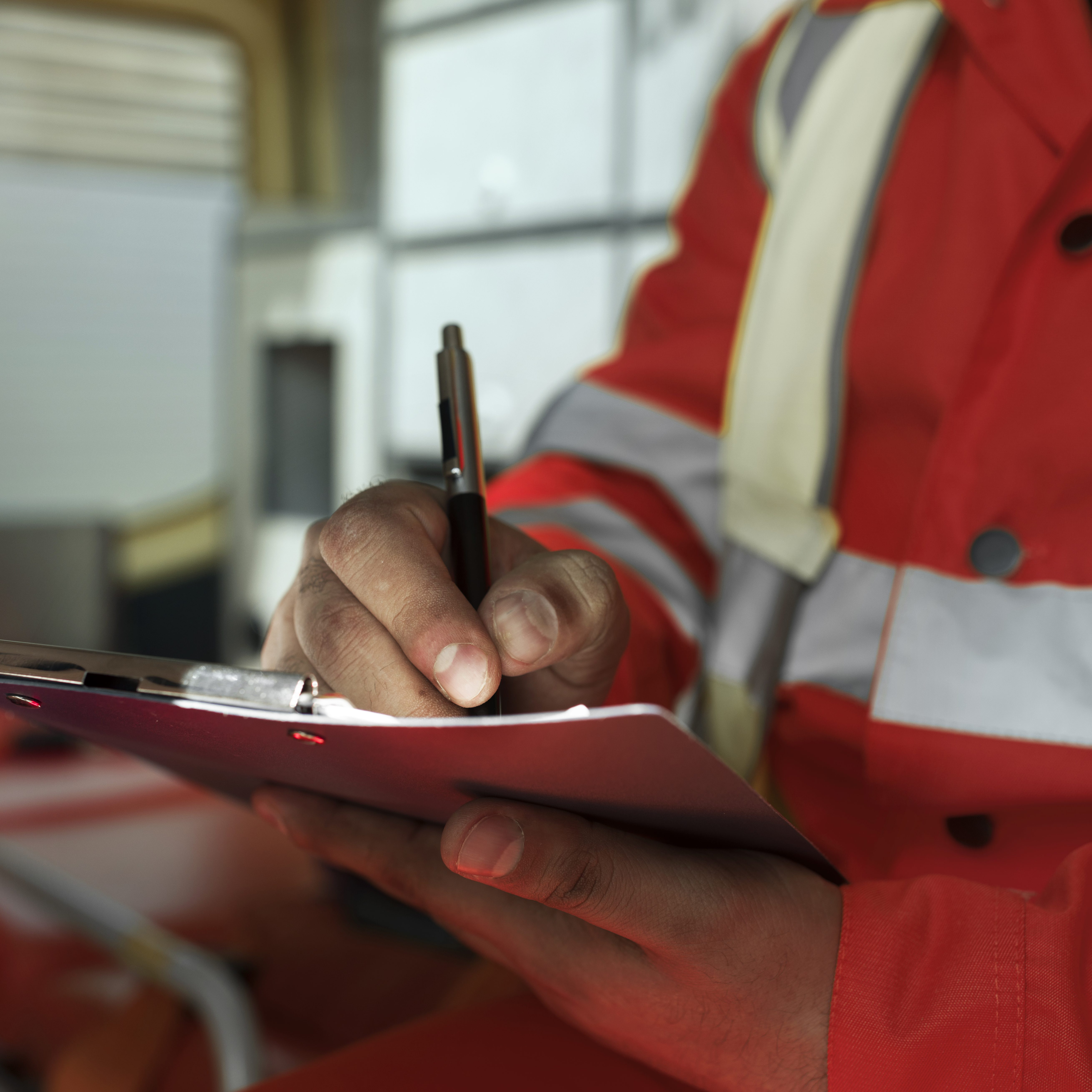 side-view-man-taking-notes-ambulance-car side-view-man-taking-notes-ambulance-car
